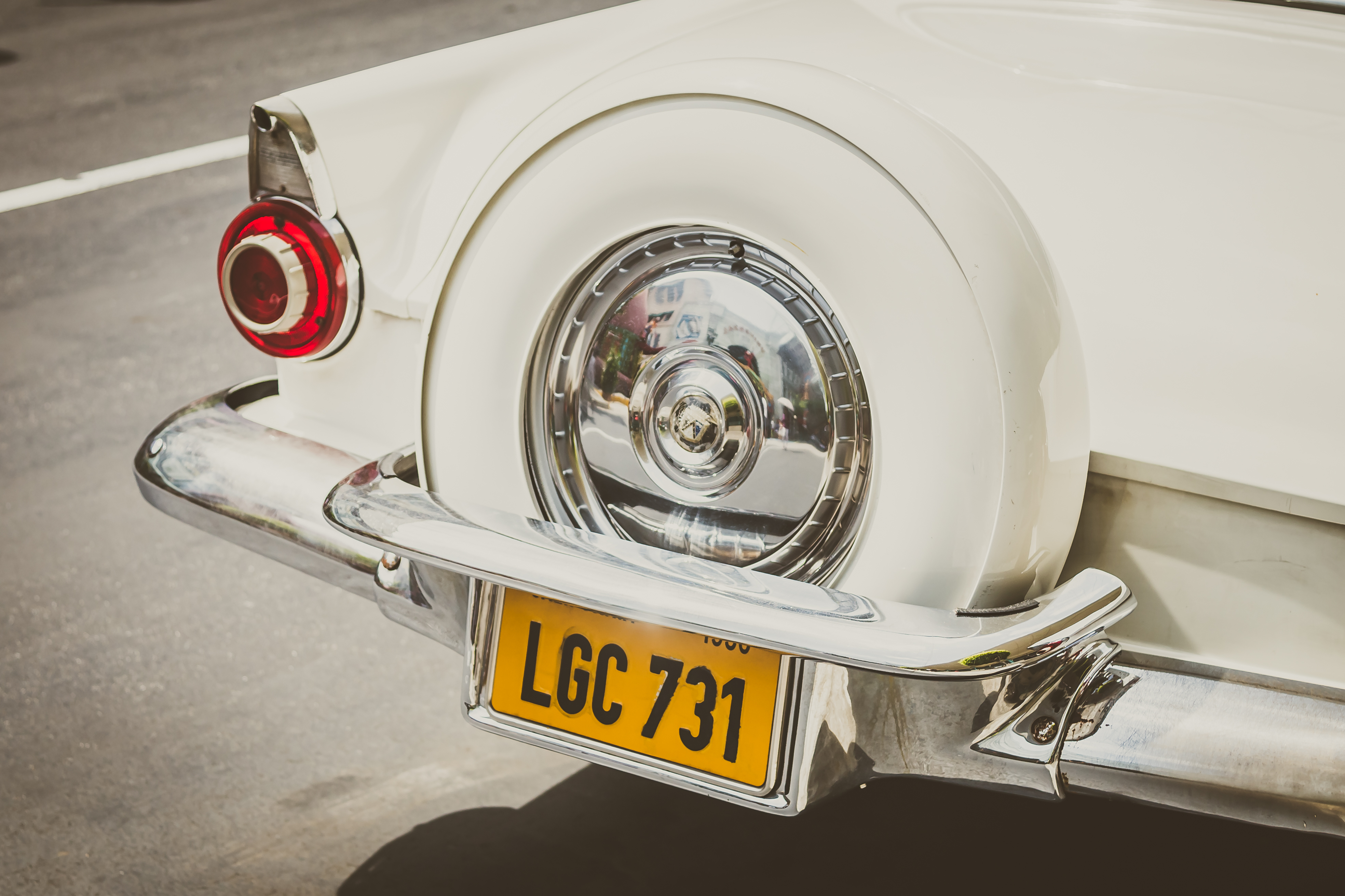 yellow number plate on car